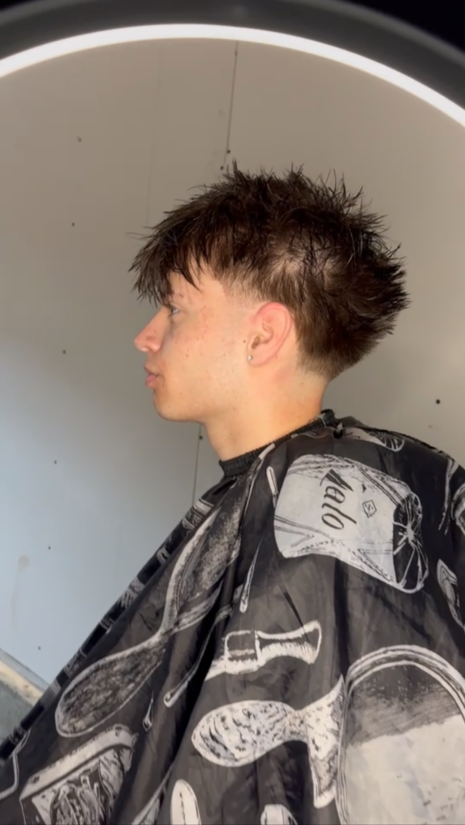 Textured mullet with a clean low fade
